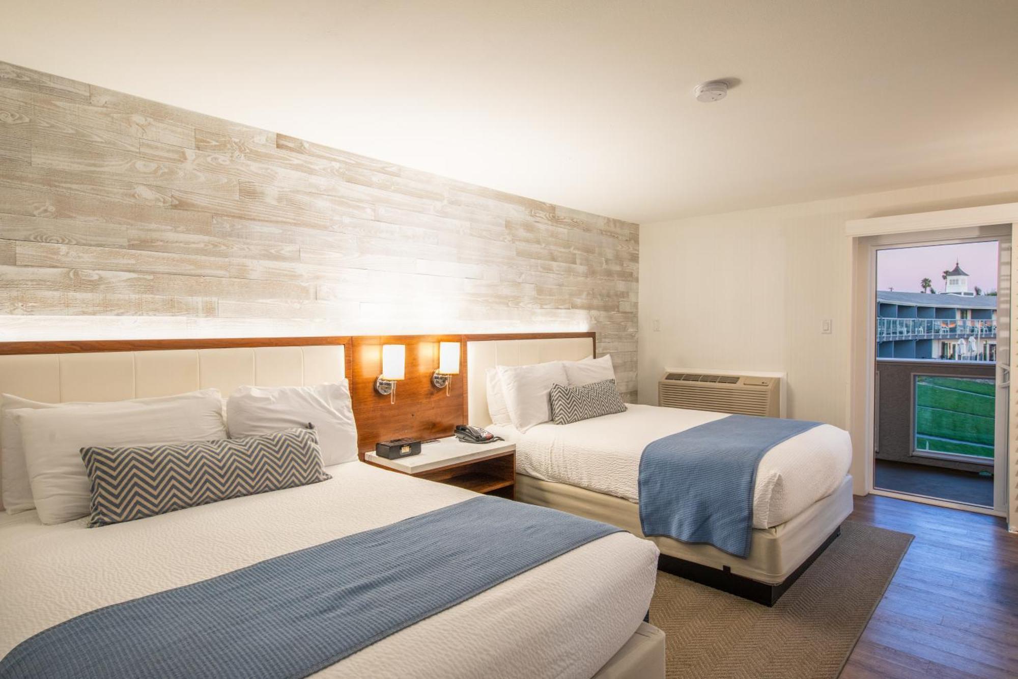 Queen Room Two Queen Beds Partial Ocean View