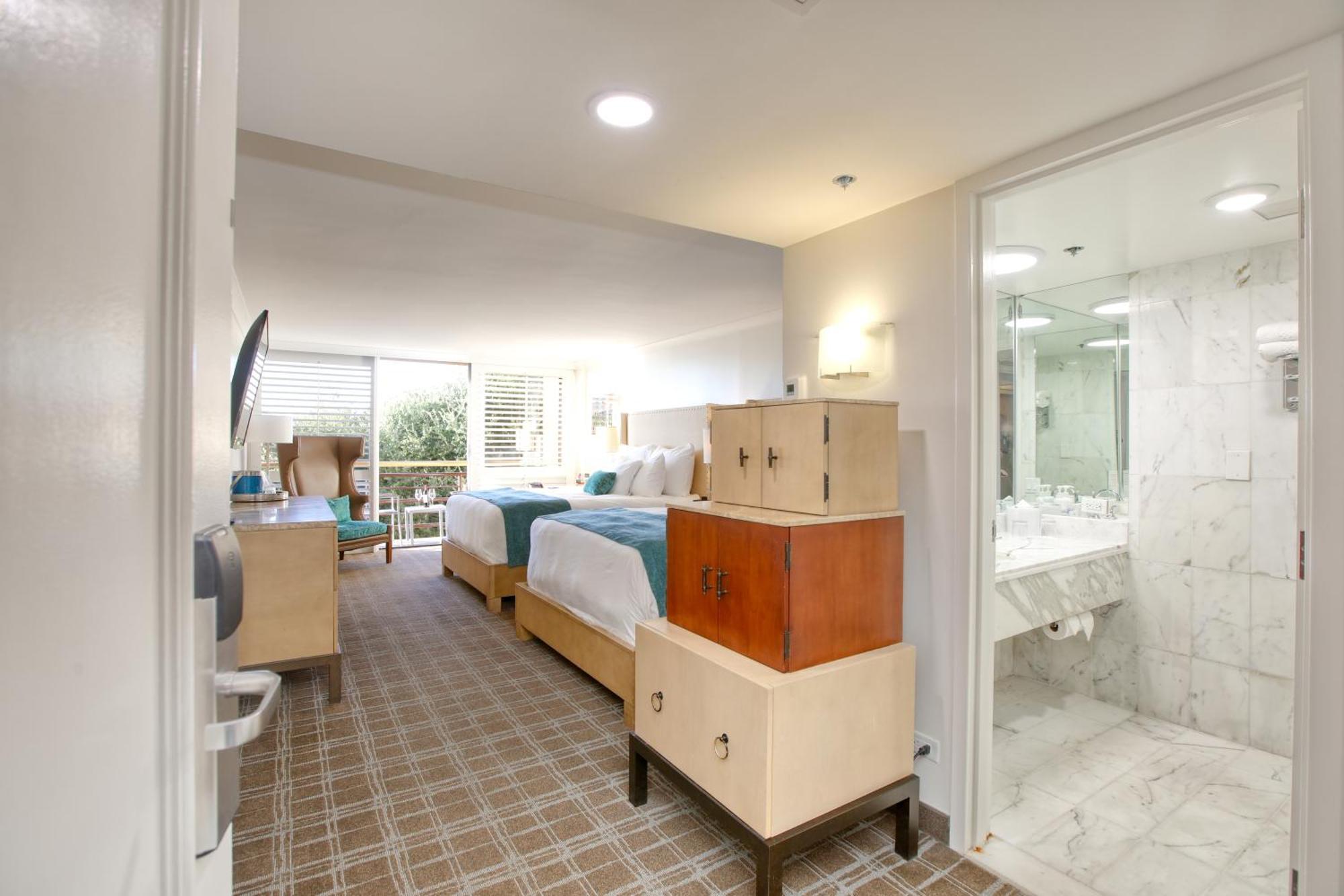 Queen Room Two Queen Beds Partial Ocean View